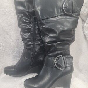 Knee high boots,  partial zipper on ins of boots.